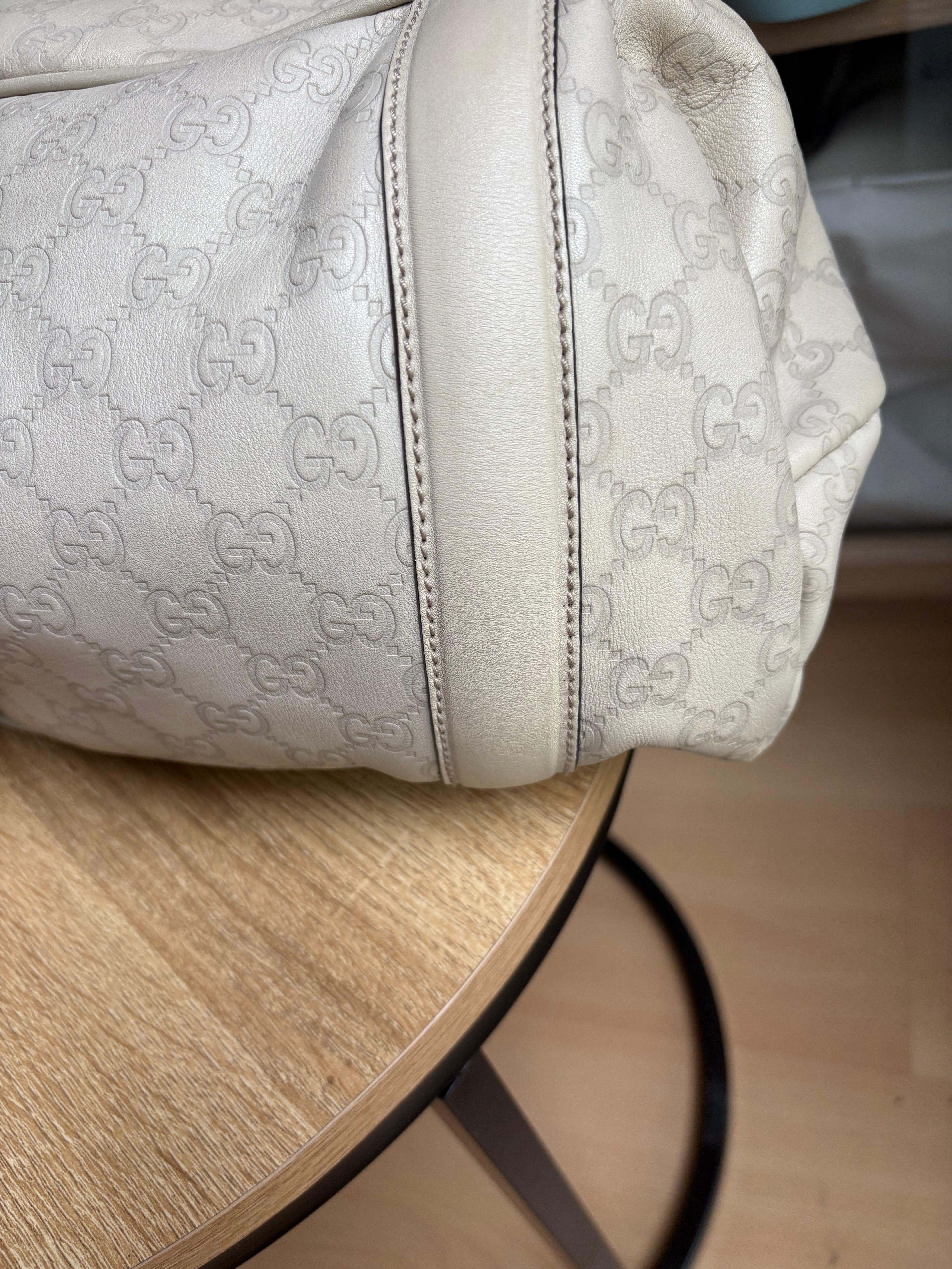 Gucci Pelham en piel Guccissima blanca