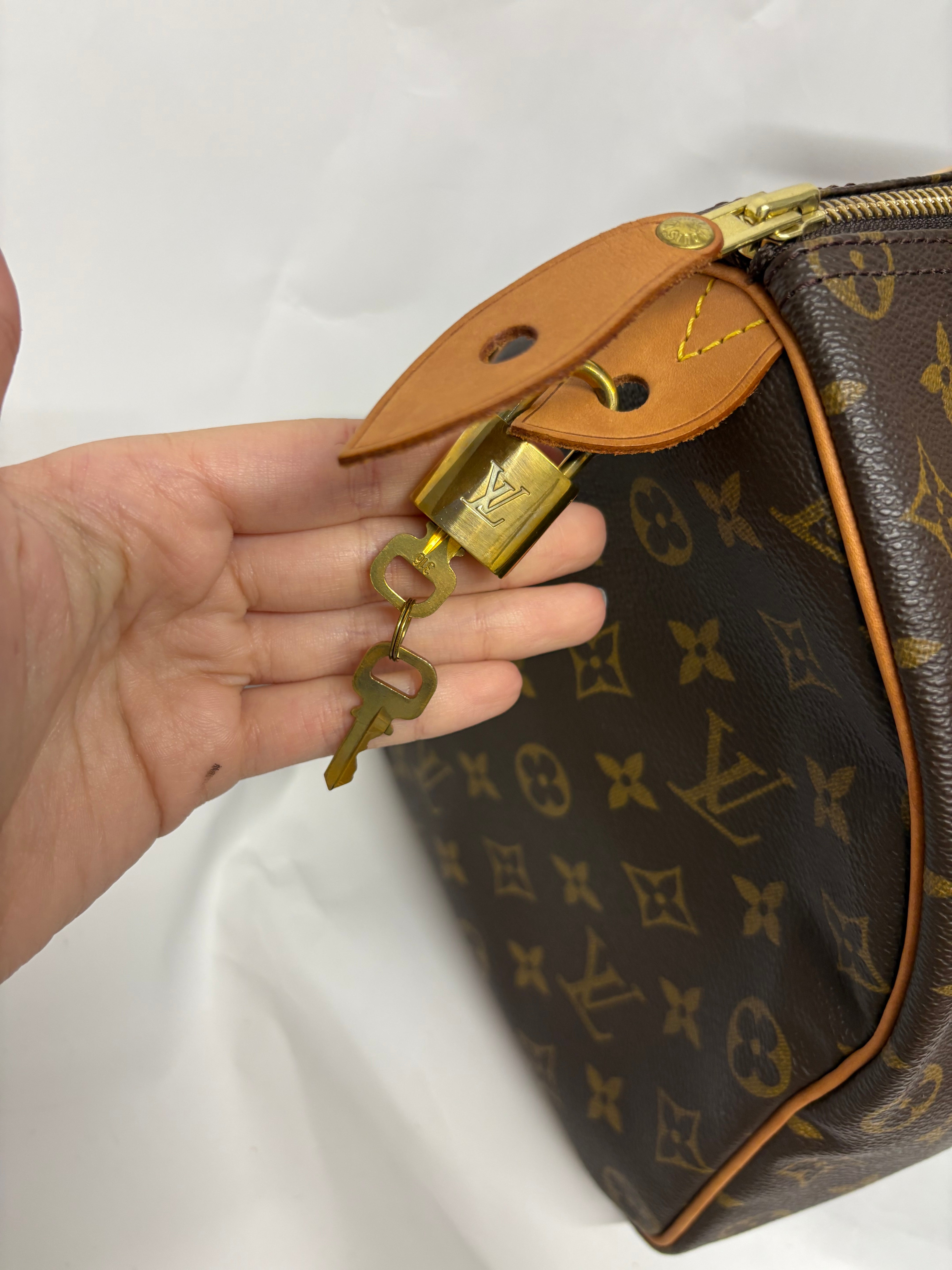 Louis Vuitton speedy 35 canvas monogram con bandolera extra