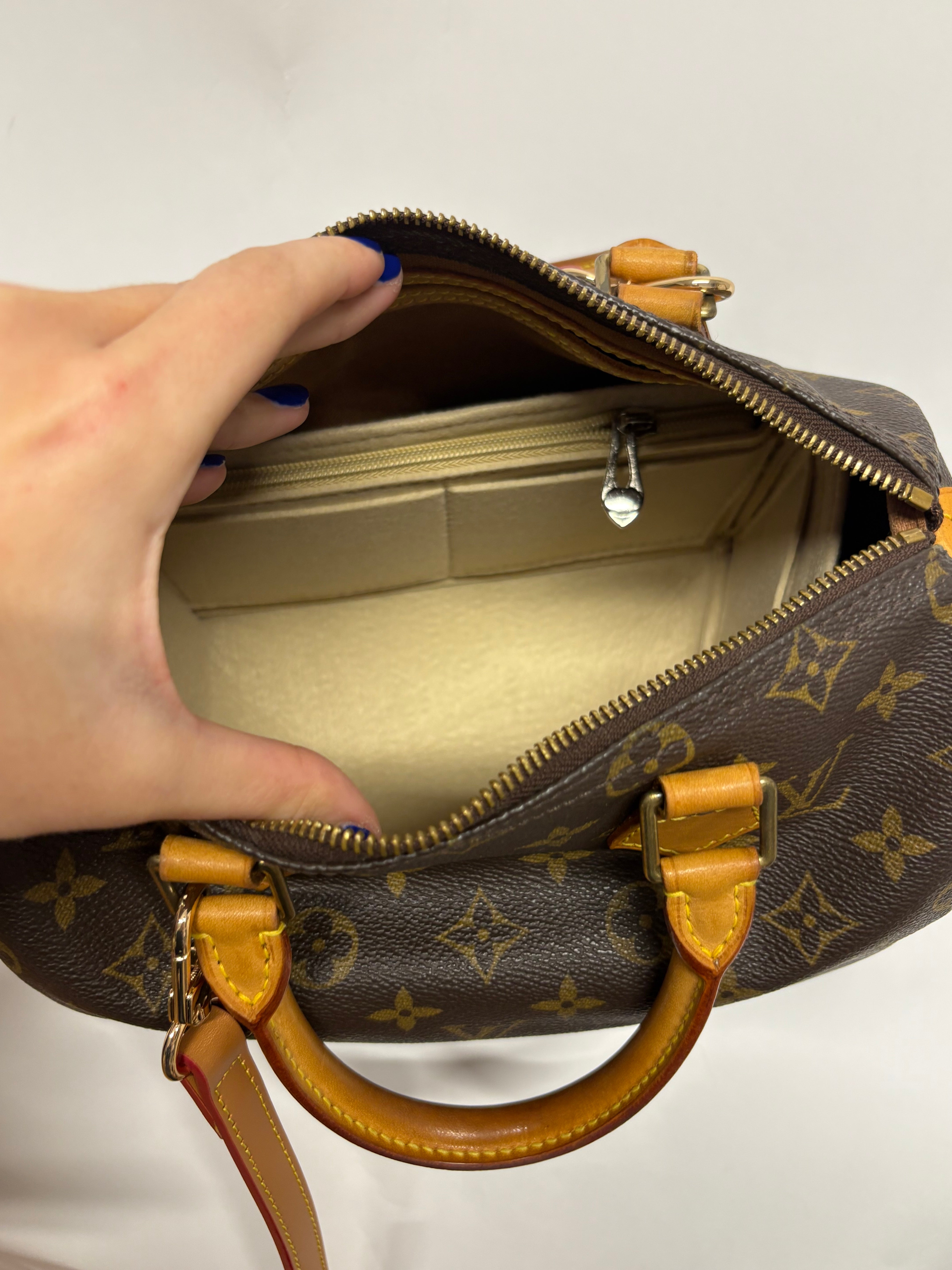 Louis Vuitton Speedy 25 Monogram con bandolera extra