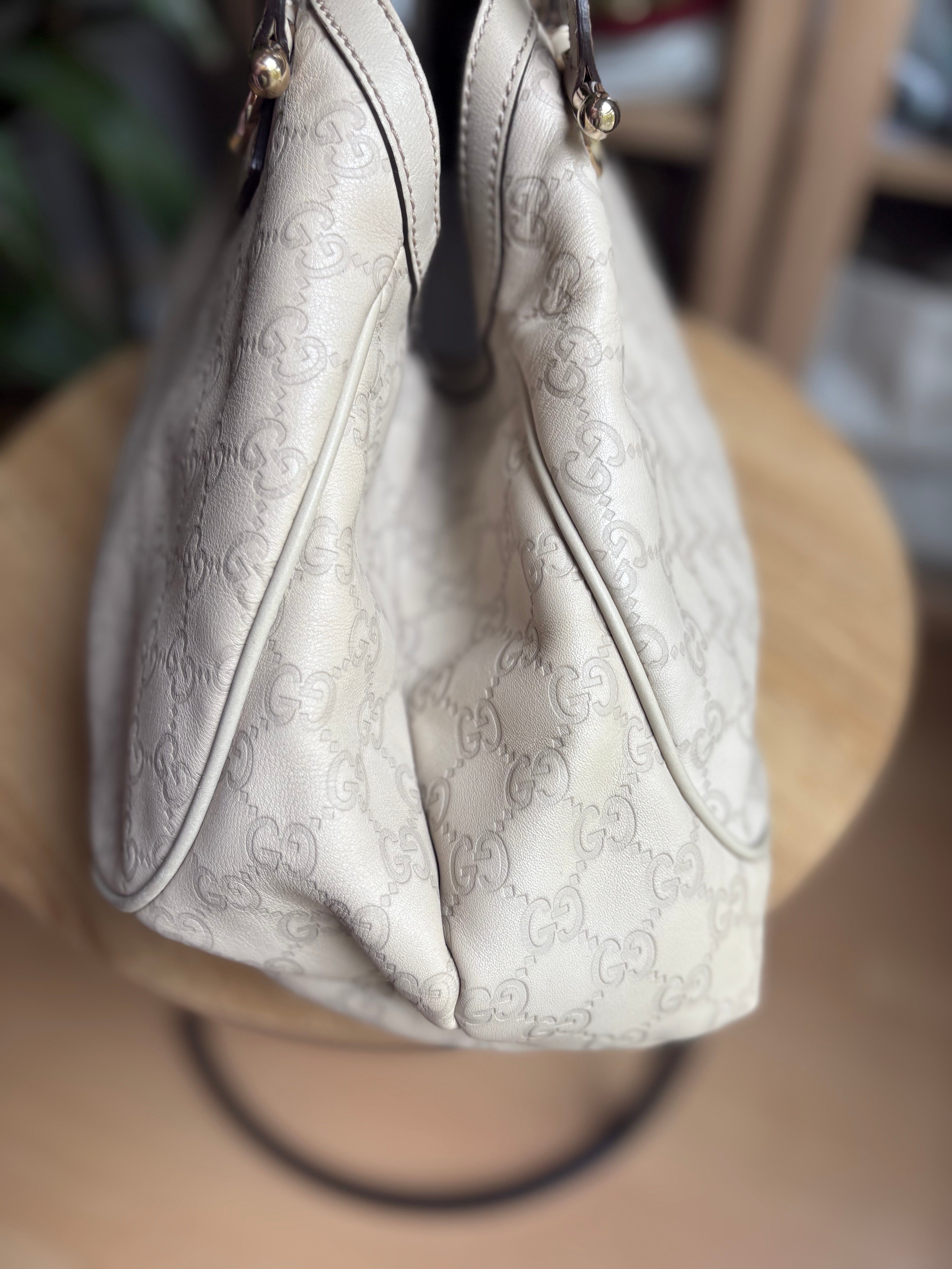 Gucci Pelham en piel Guccissima blanca