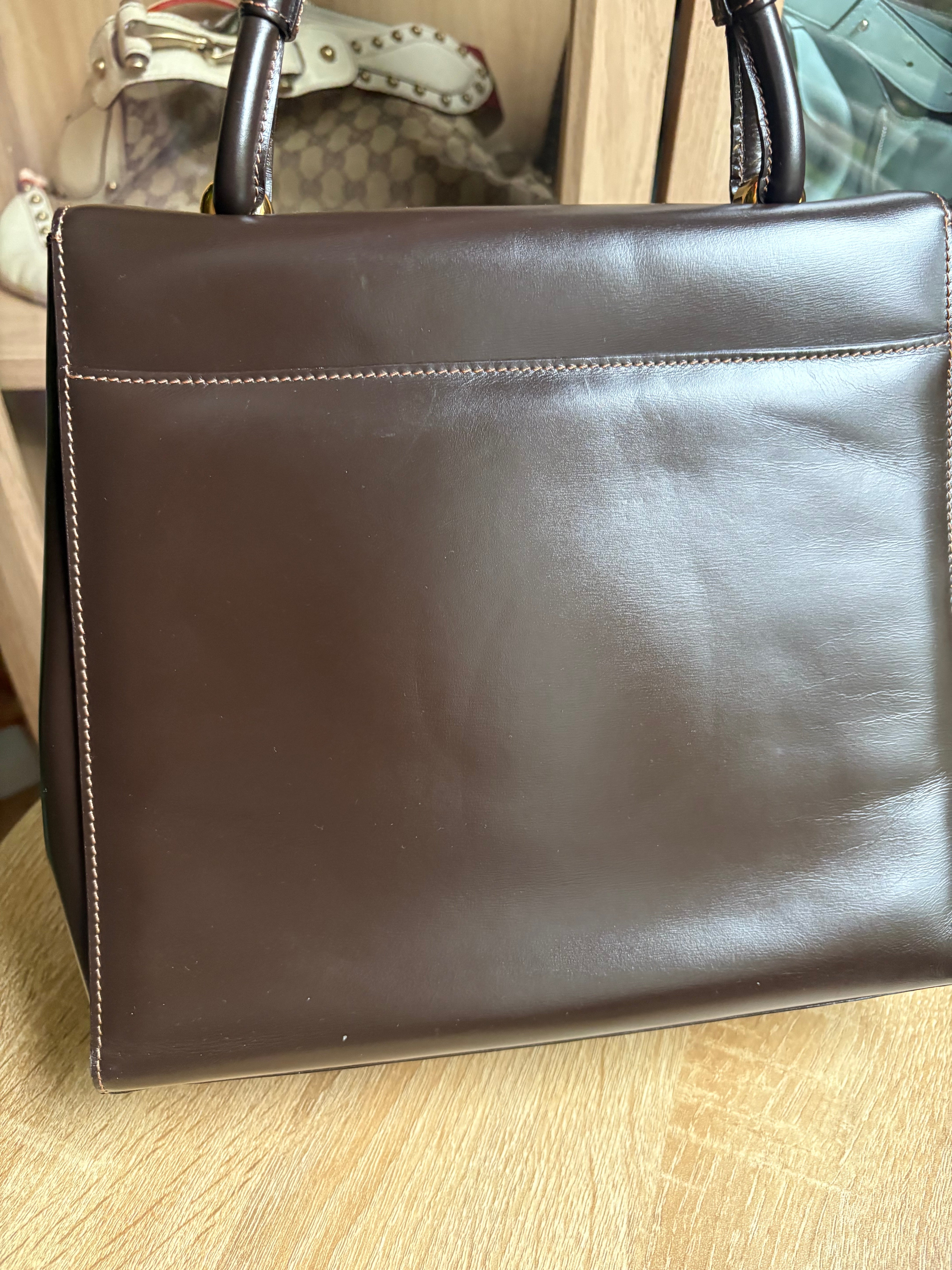 Bolso vintage Loewe de piel marrón oscuro con asa rígida y bandolera