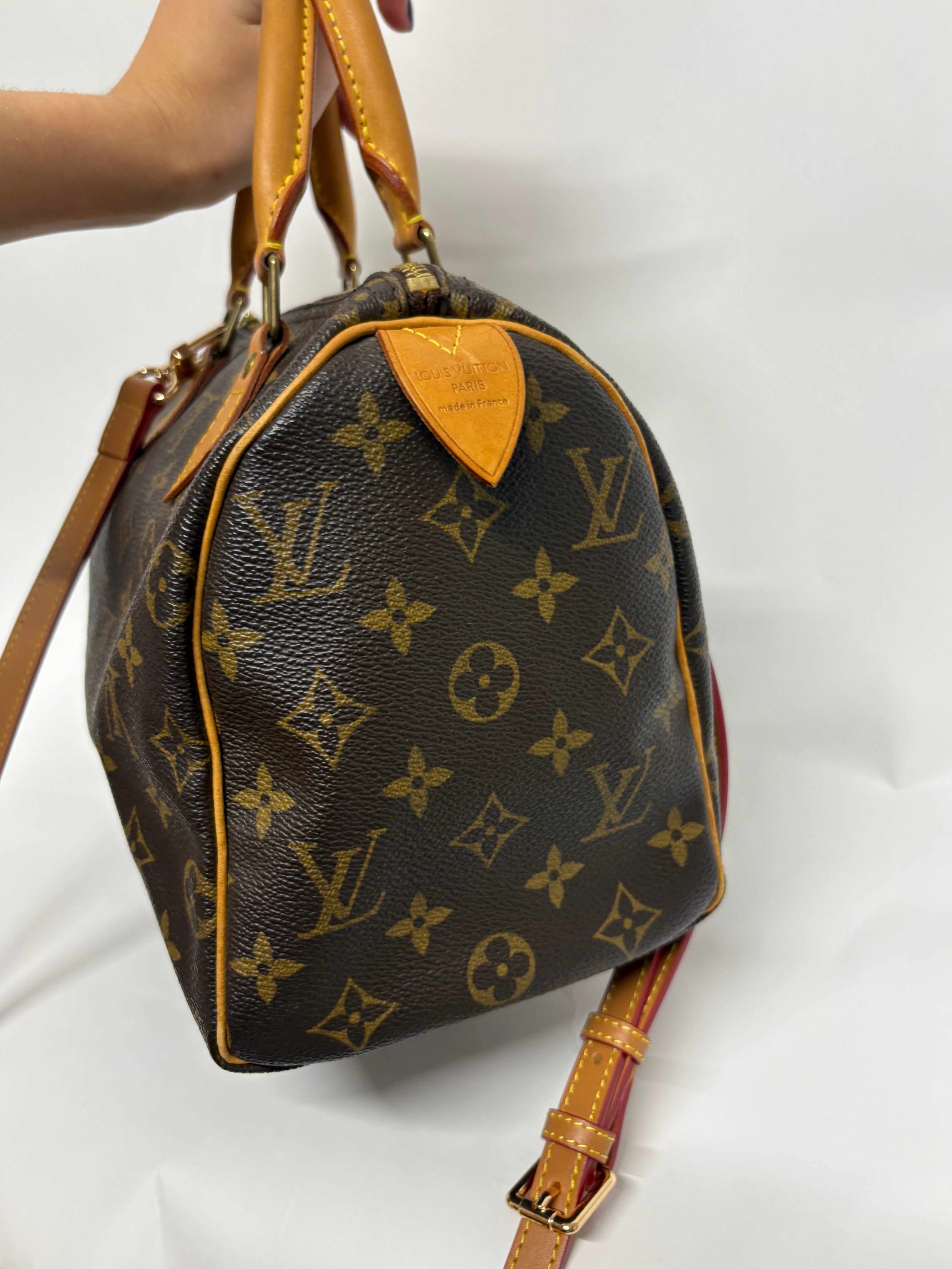 Louis Vuitton Speedy 25 Monogram con bandolera extra