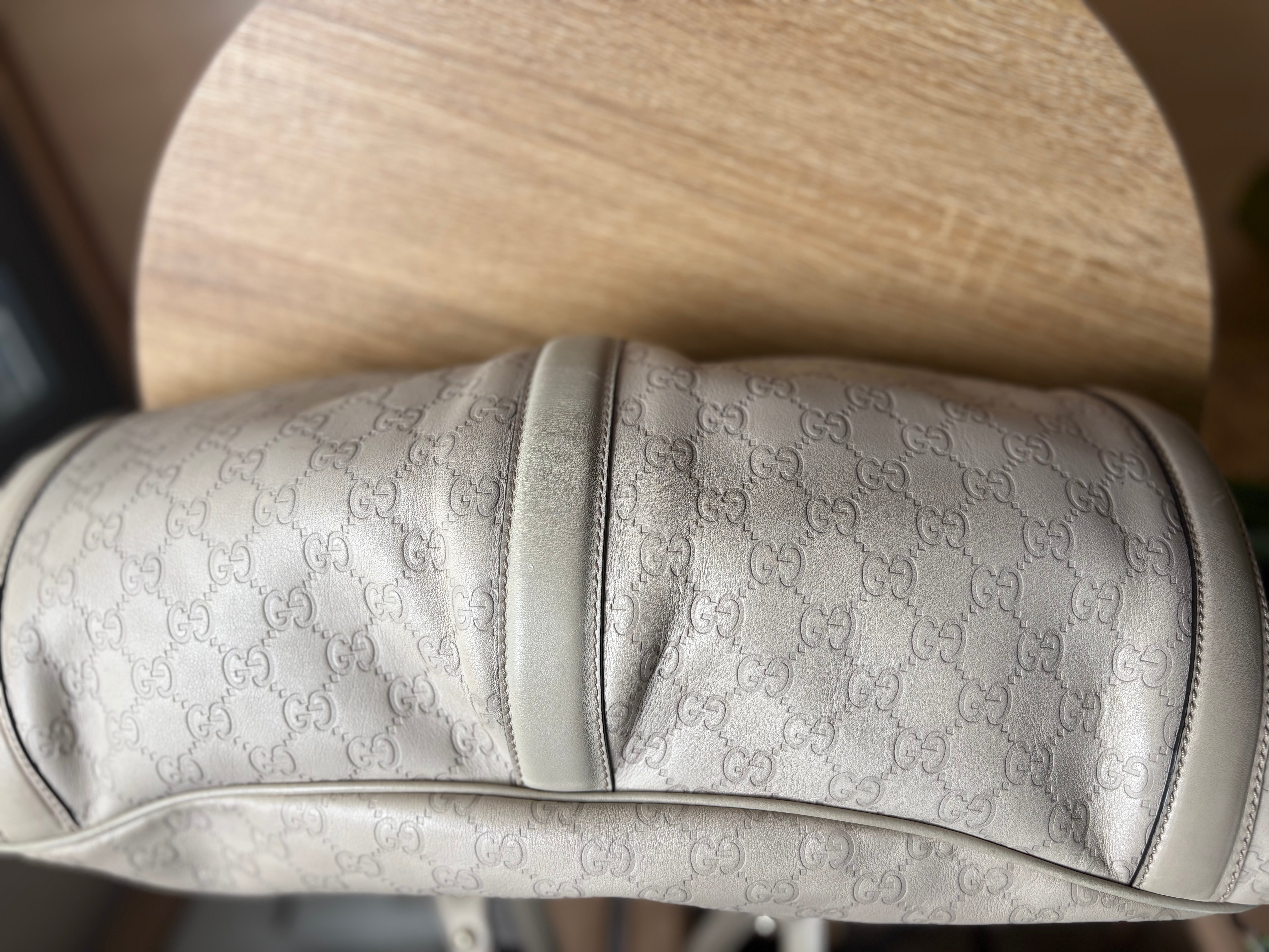 Gucci Pelham en piel Guccissima blanca