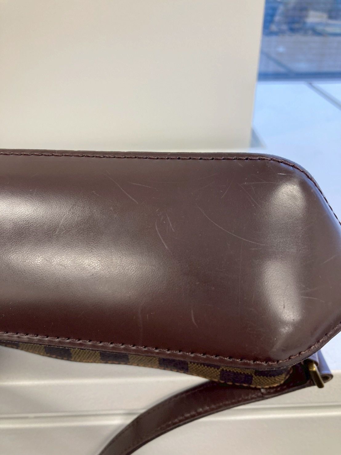Louis Vuitton Trotteur bandolera en lona Damier Ebene