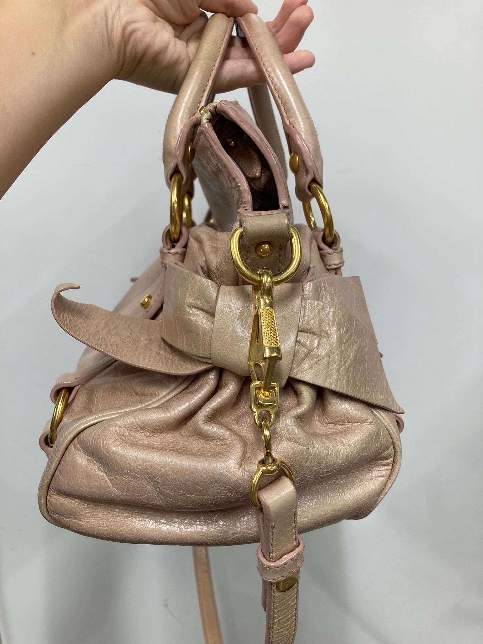 Miu Miu Vitello small rosa claro con bandolera