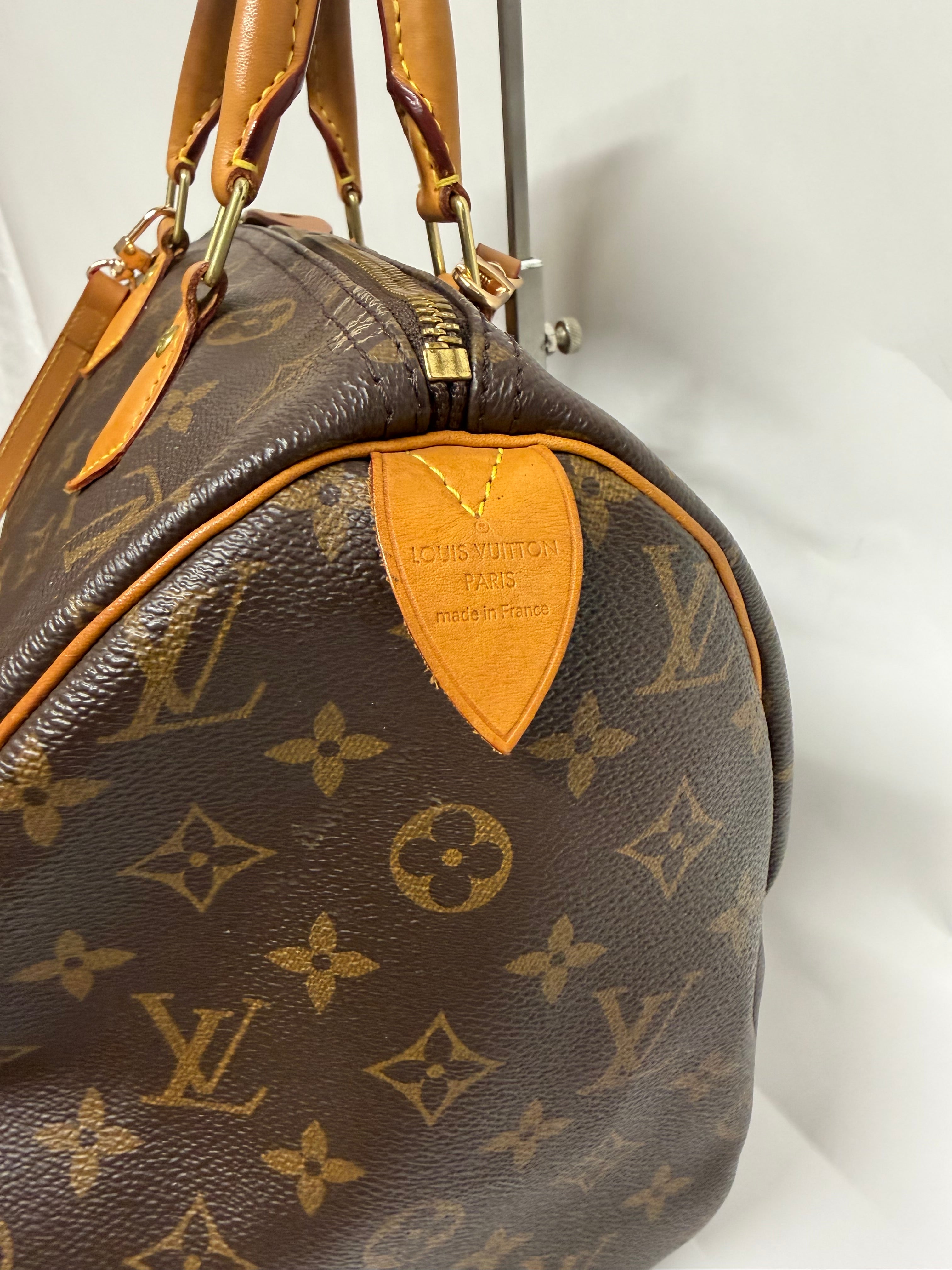 Louis Vuitton Speedy 30 Monogram con bandolera extra