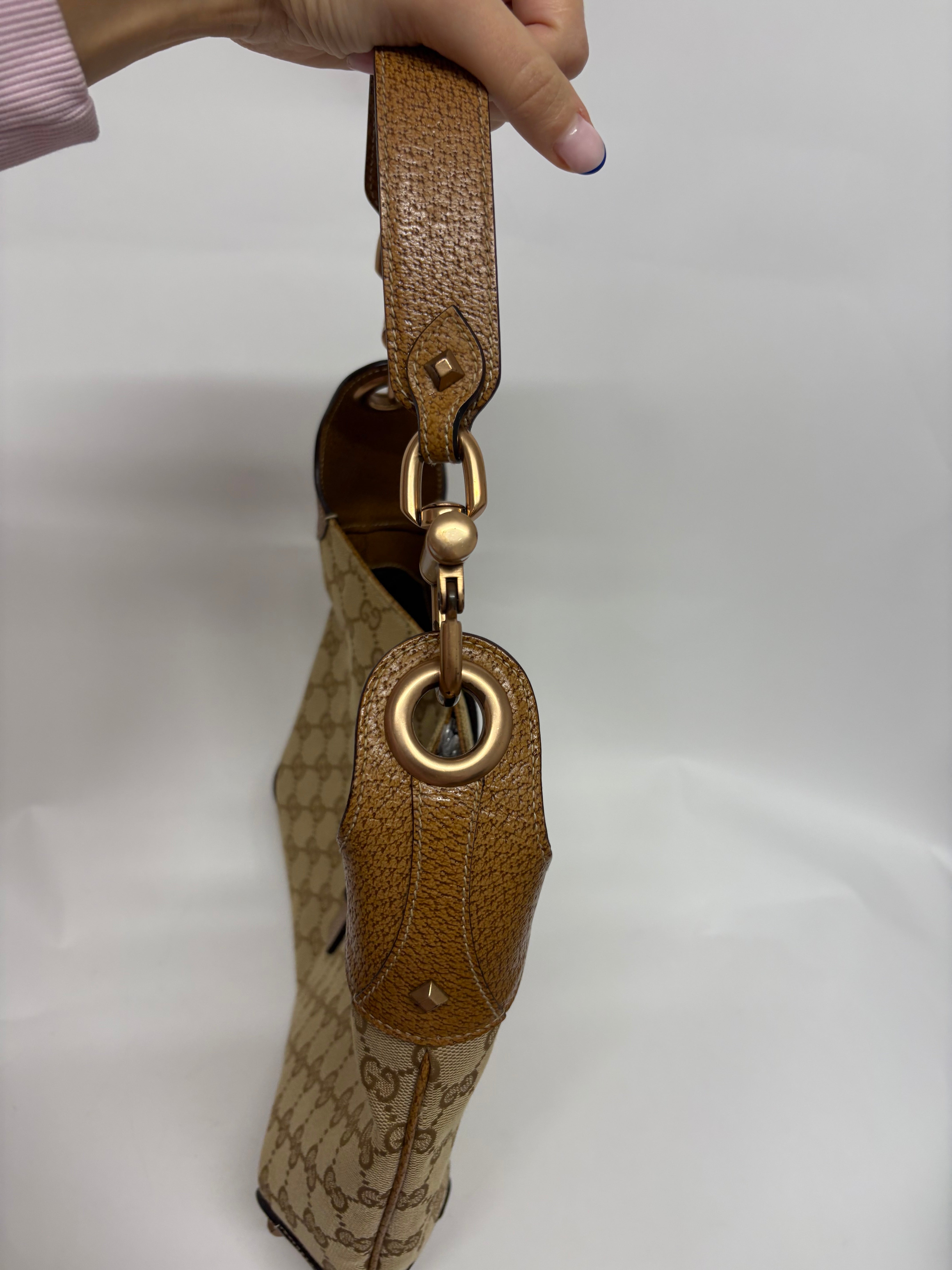 Gucci jackie gg canvas gold rosado y marron