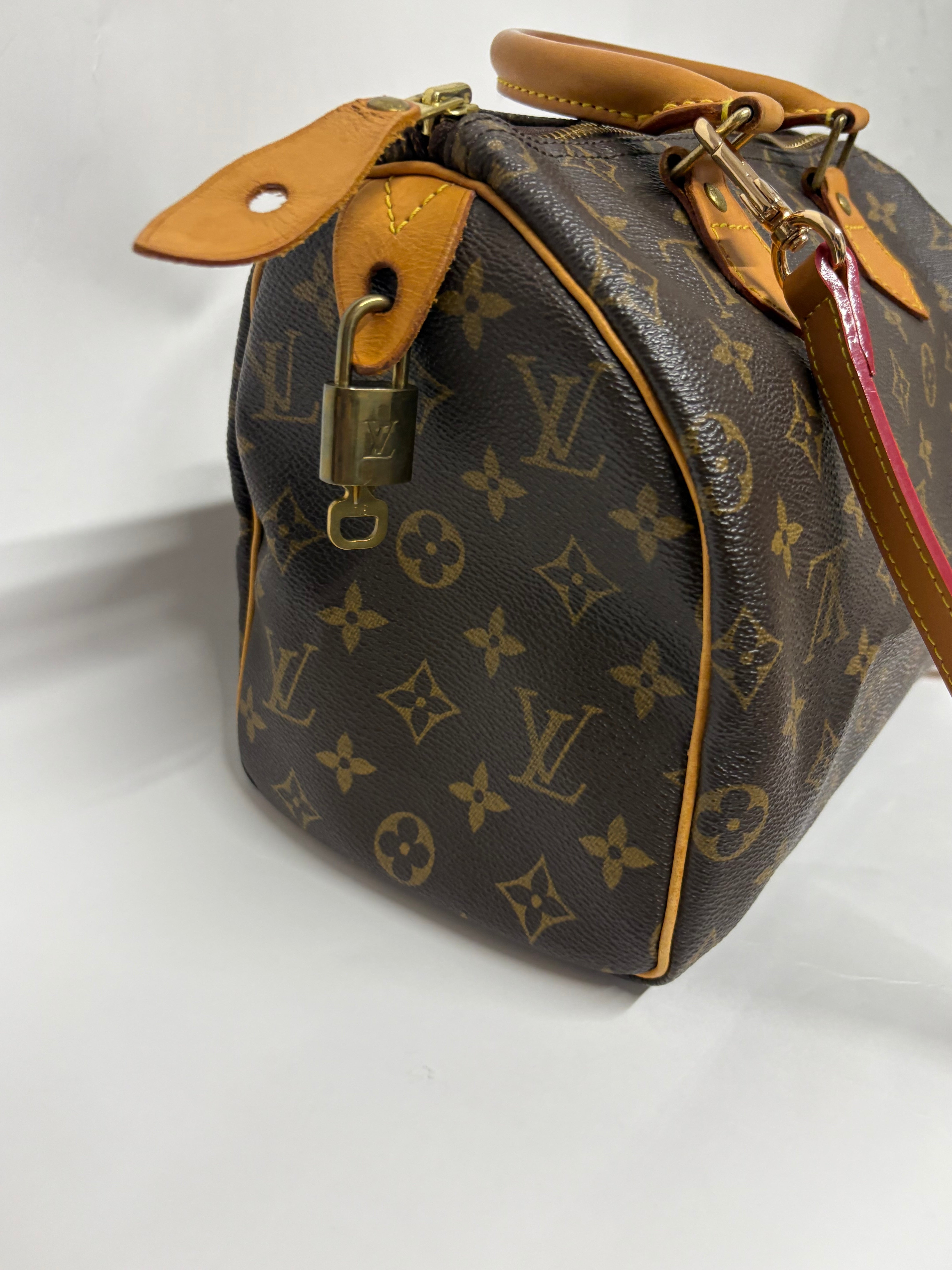 Louis Vuitton Speedy 25 Monogram con bandolera extra