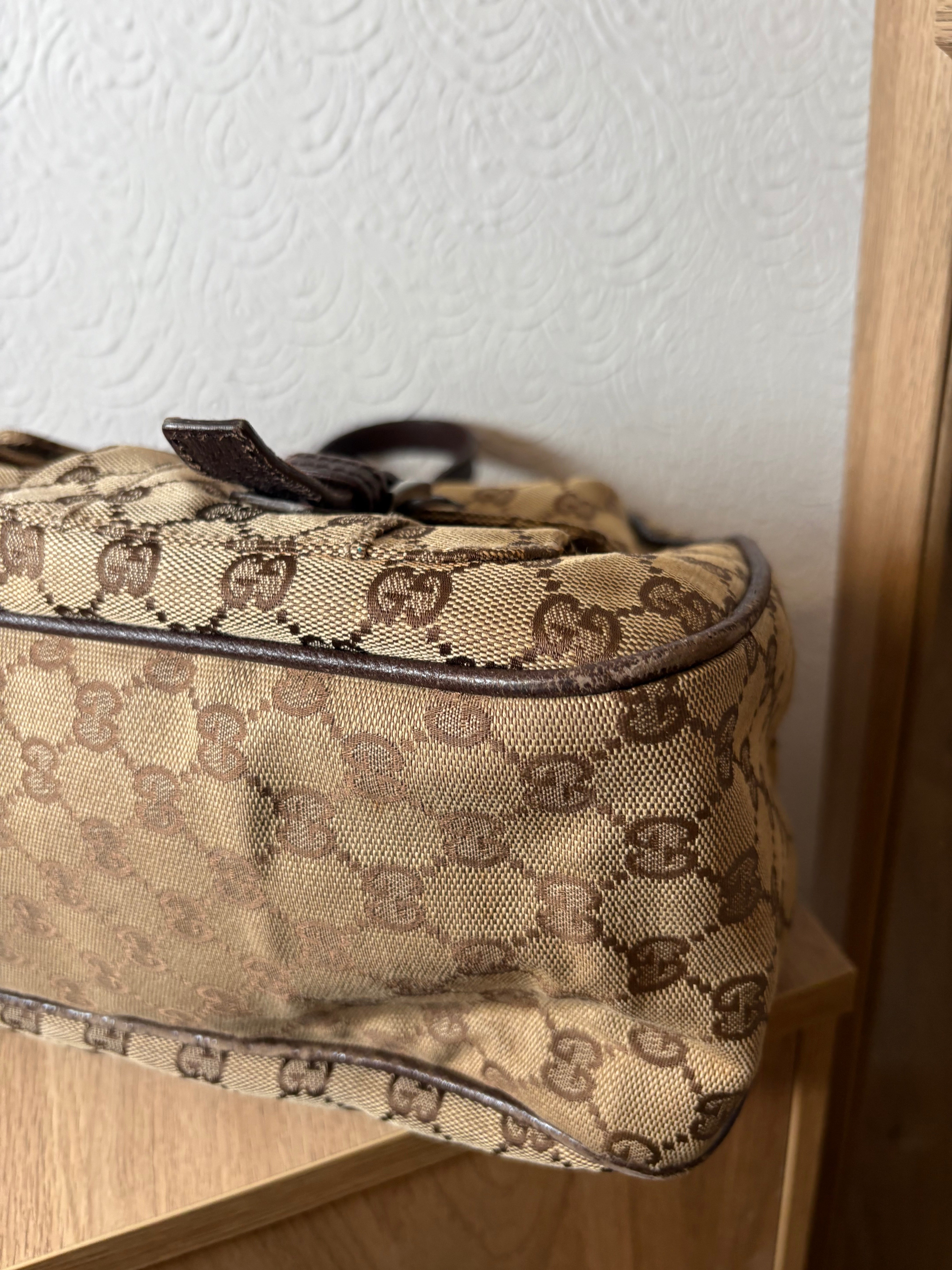 GUCCI  Bolso de hombro GG Canvas con bolsillos frontales