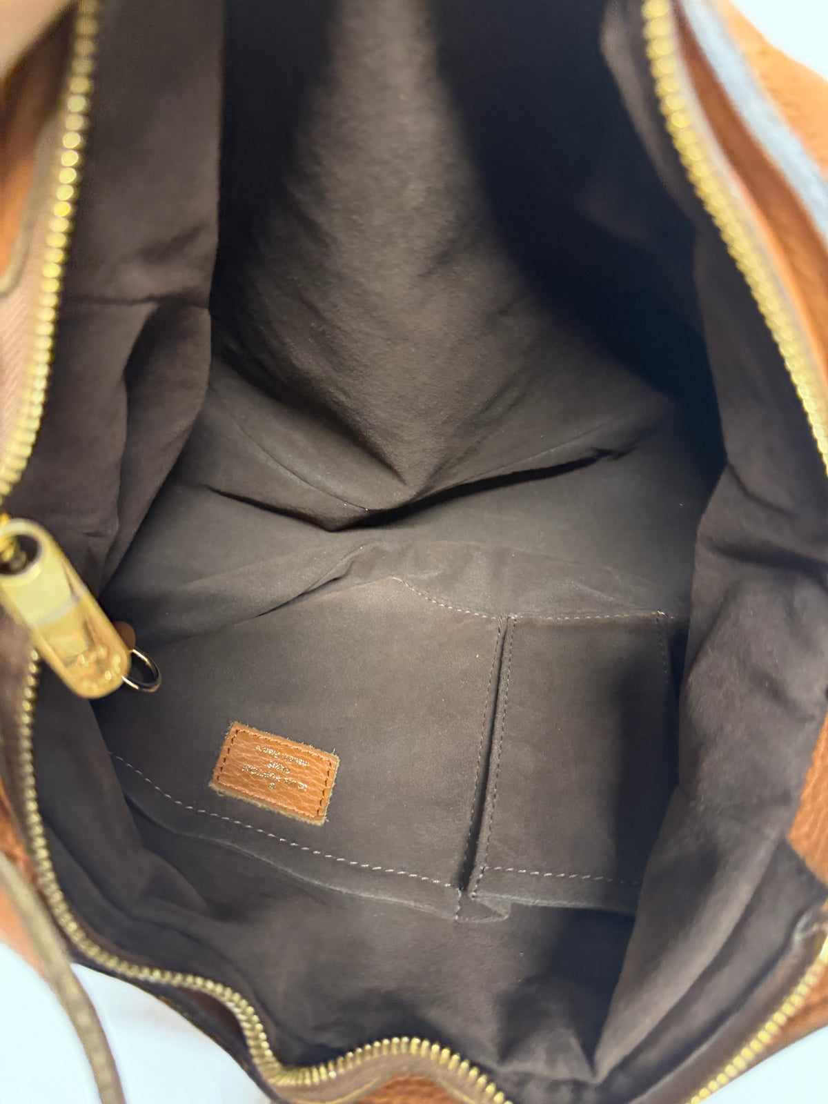 Louis Vuitton Mahina bandolera Piel Perforada Marrón Coñac