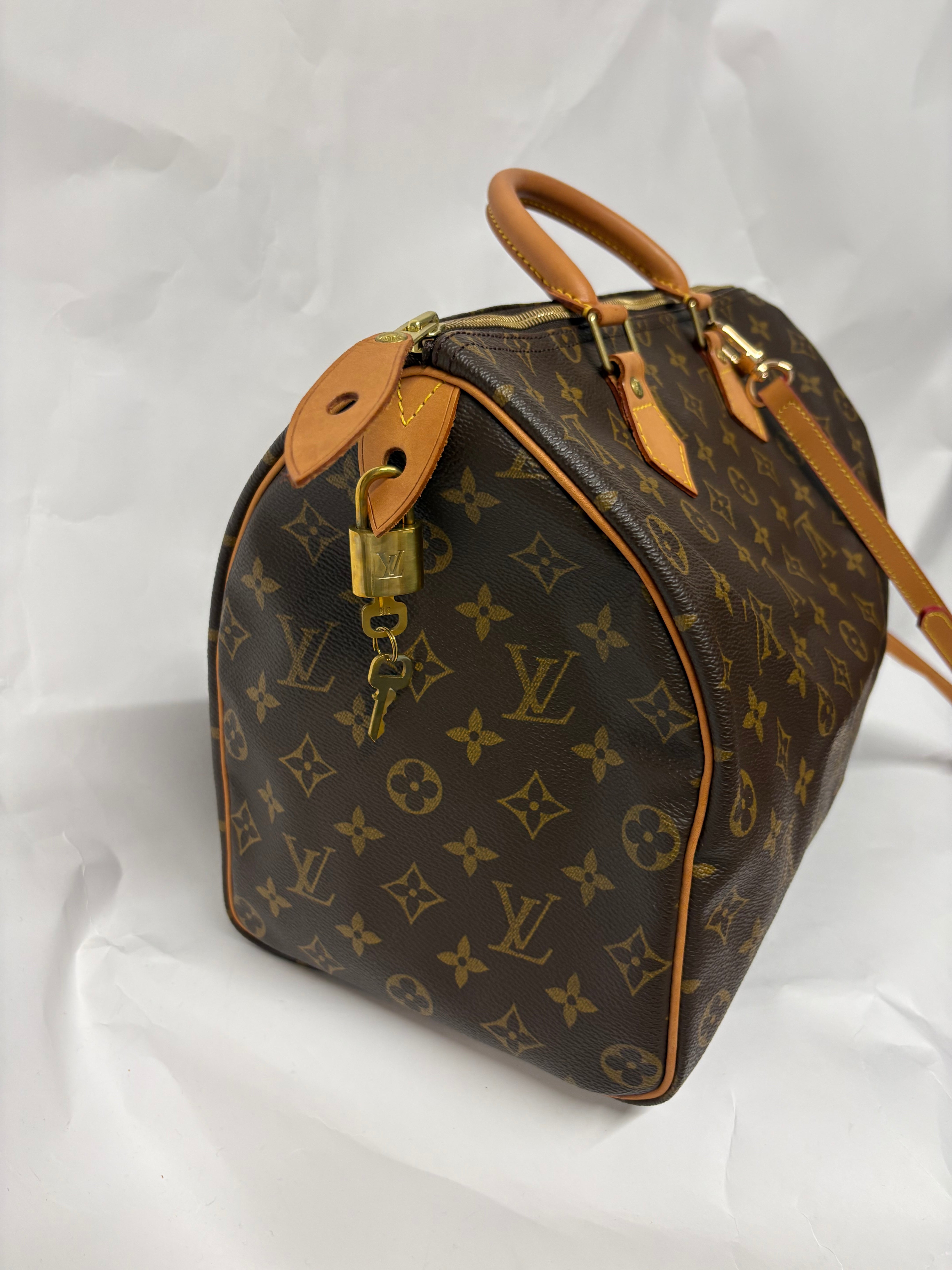 Louis Vuitton speedy 35 canvas monogram con bandolera extra