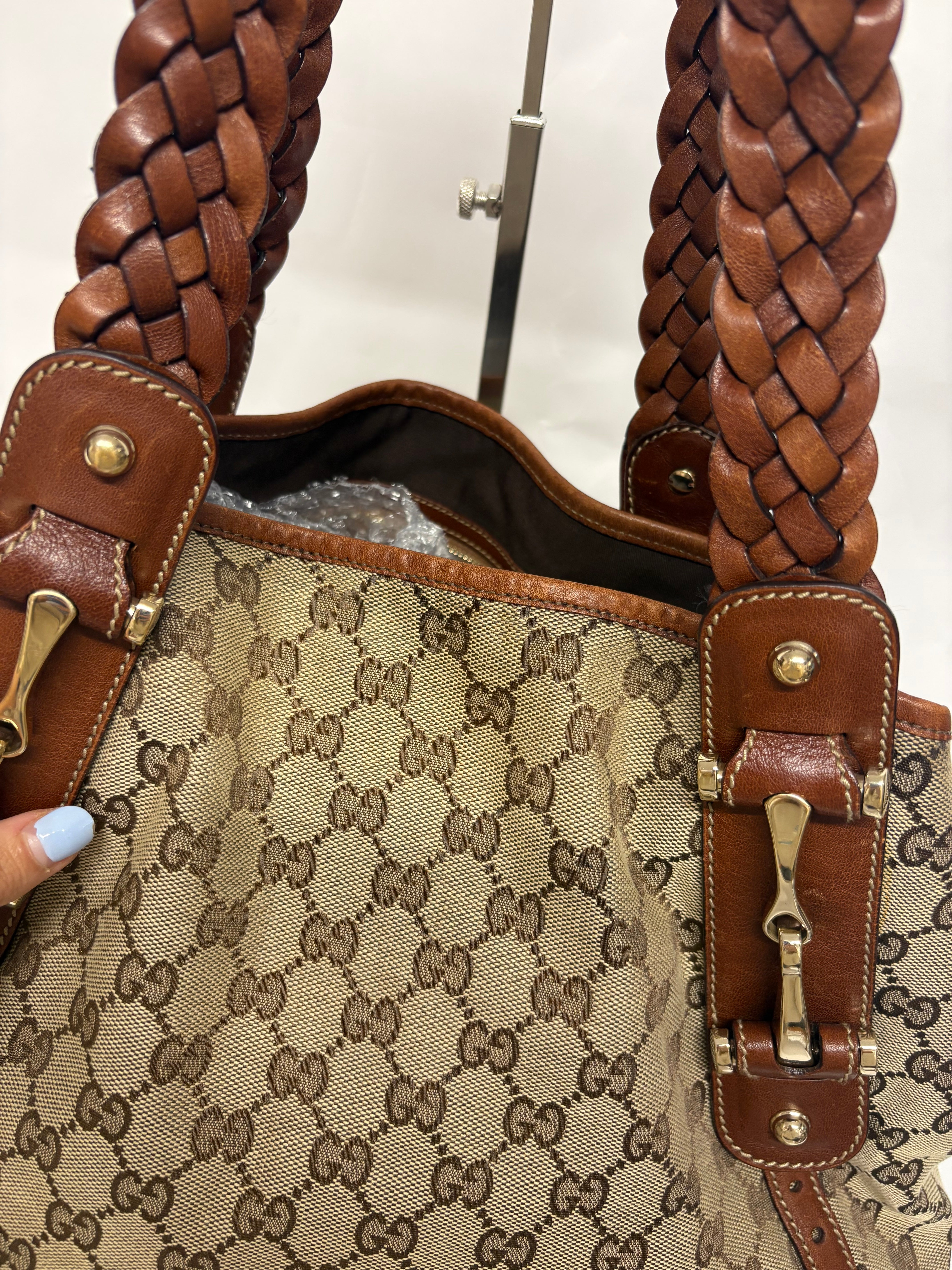 Gucci Pelham clásico en lona GG beige con piel marrón y asas trenzadas mediano