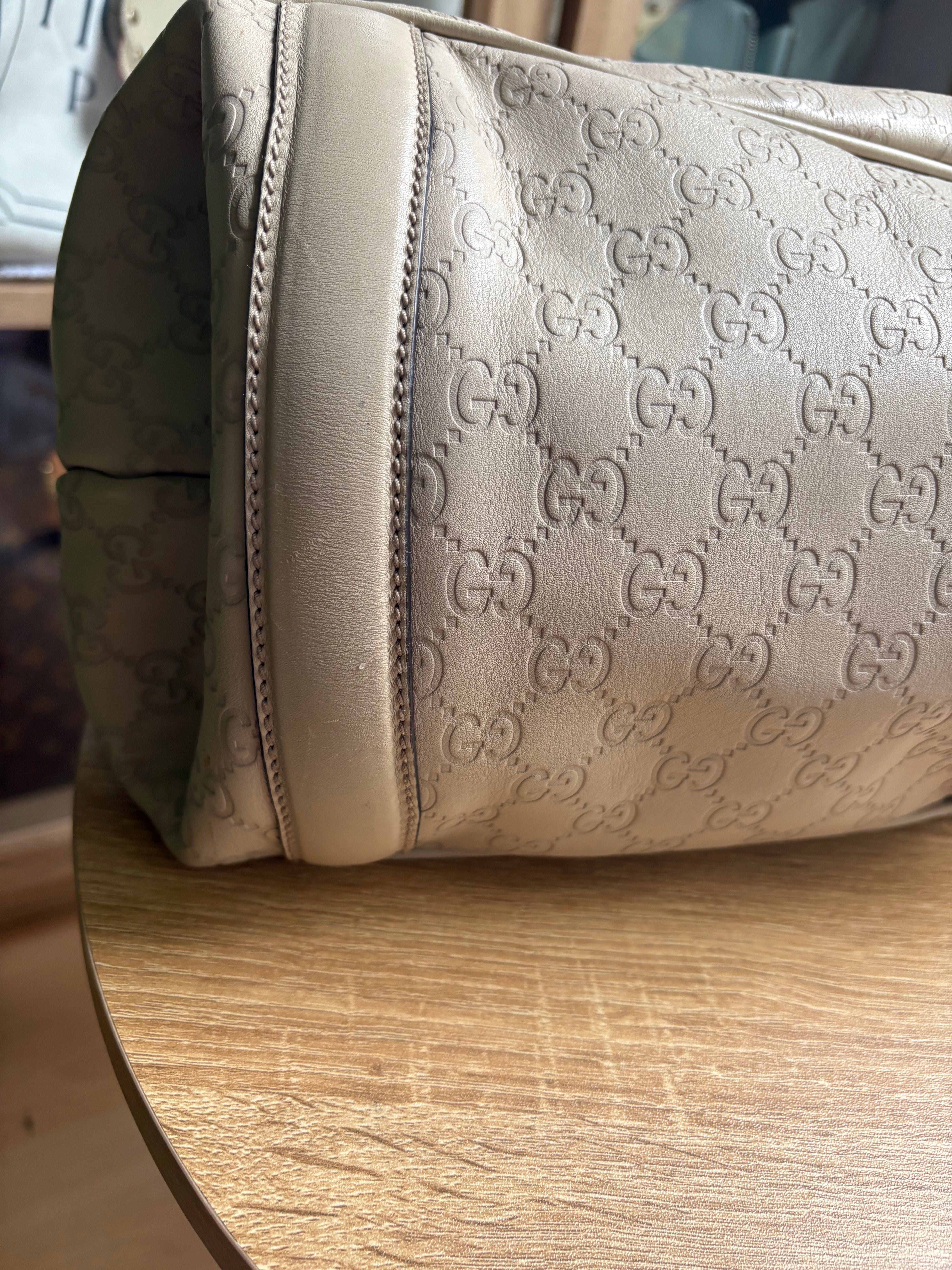 Gucci Pelham en piel Guccissima blanca