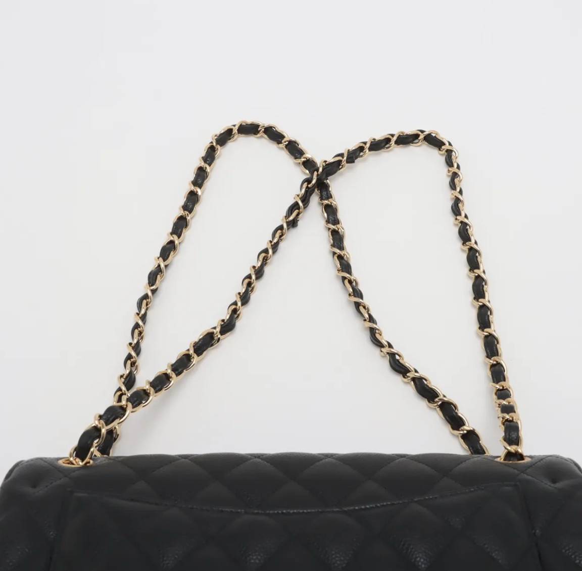 Chanel 11.12 Double Flap Jumbo en piel caviar negra