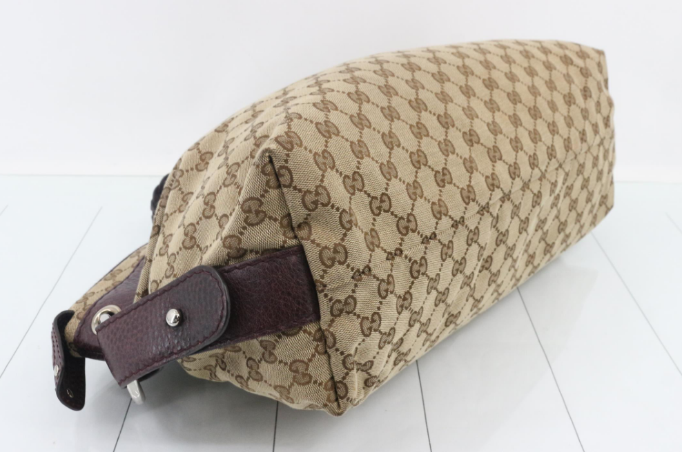 Gucci Pelham GG Canvas Marrón Oscuro / Berenjena · Piel trenzada · Gran formato