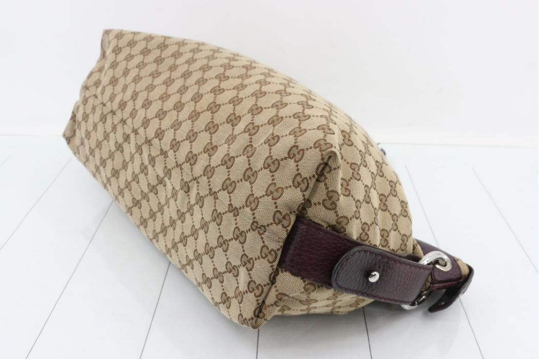 Gucci Pelham GG Canvas Marrón Oscuro / Berenjena · Piel trenzada · Gran formato