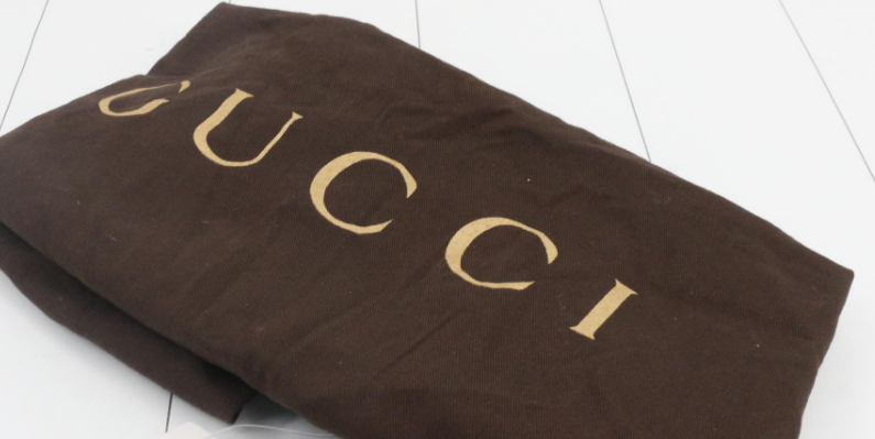 Gucci Pelham GG Canvas Marrón Oscuro / Berenjena · Piel trenzada · Gran formato
