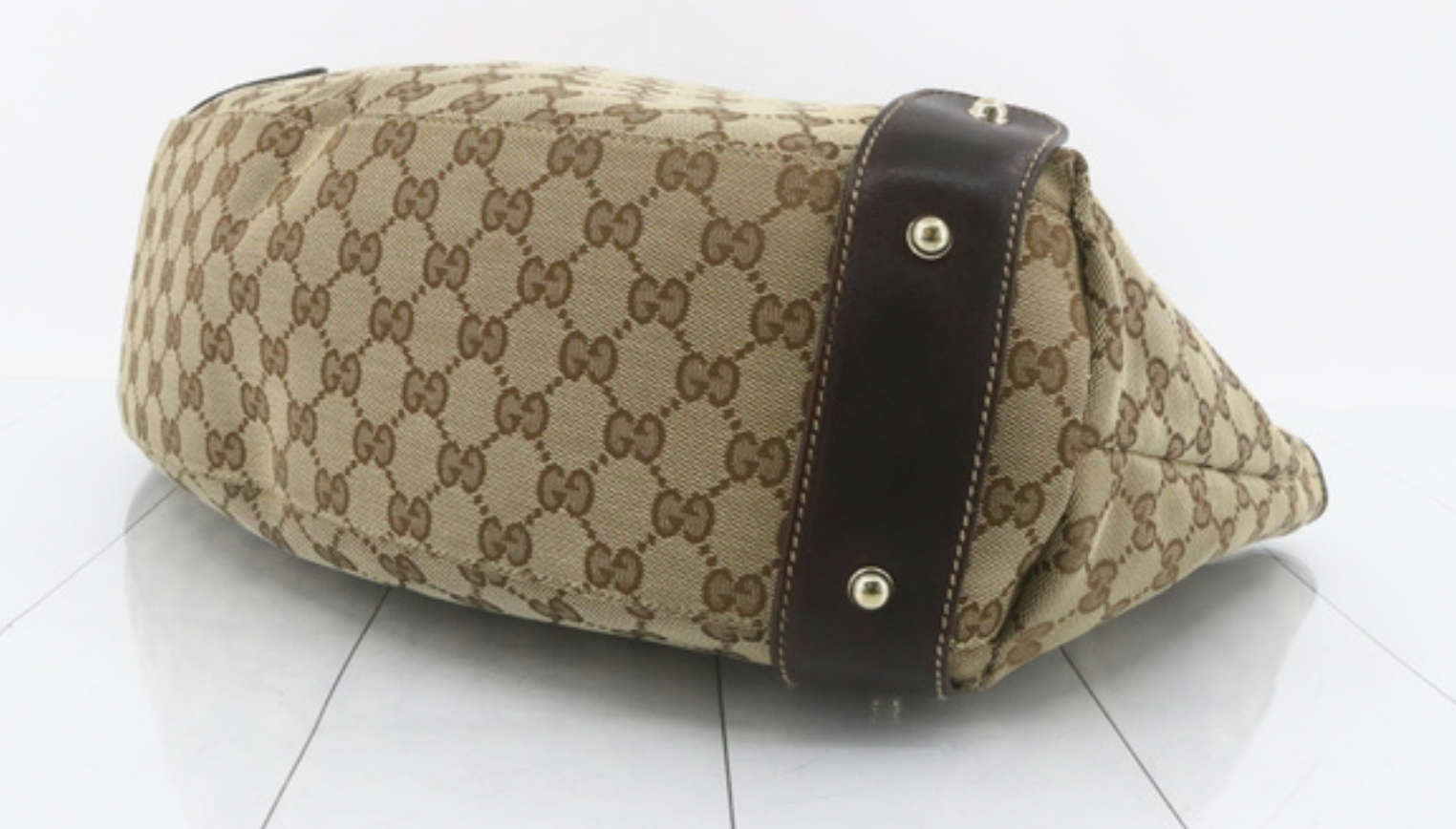 Gucci Pelham GG Canvas con Asas Marrones