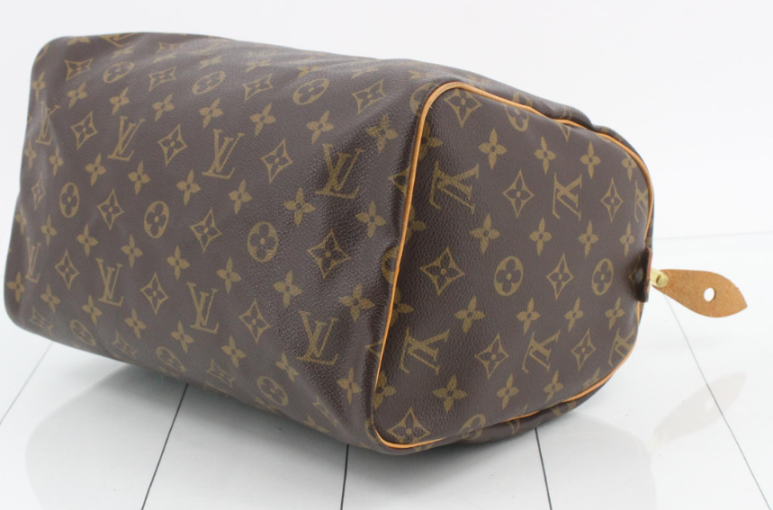 Louis Vuitton Speedy 30 Monogram con bandolera extra SD0021
