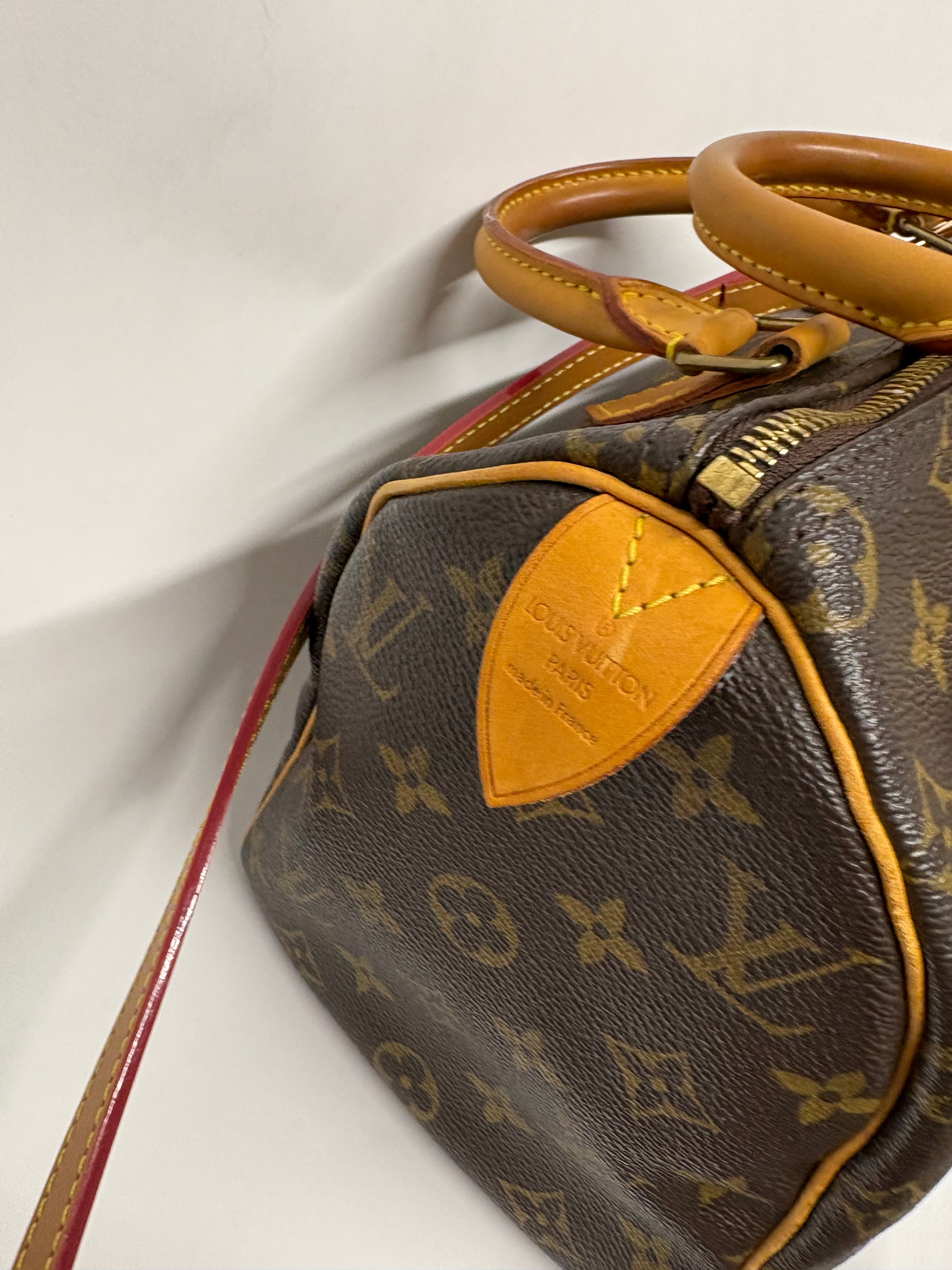 Louis Vuitton Speedy 25 Monogram con bandolera extra