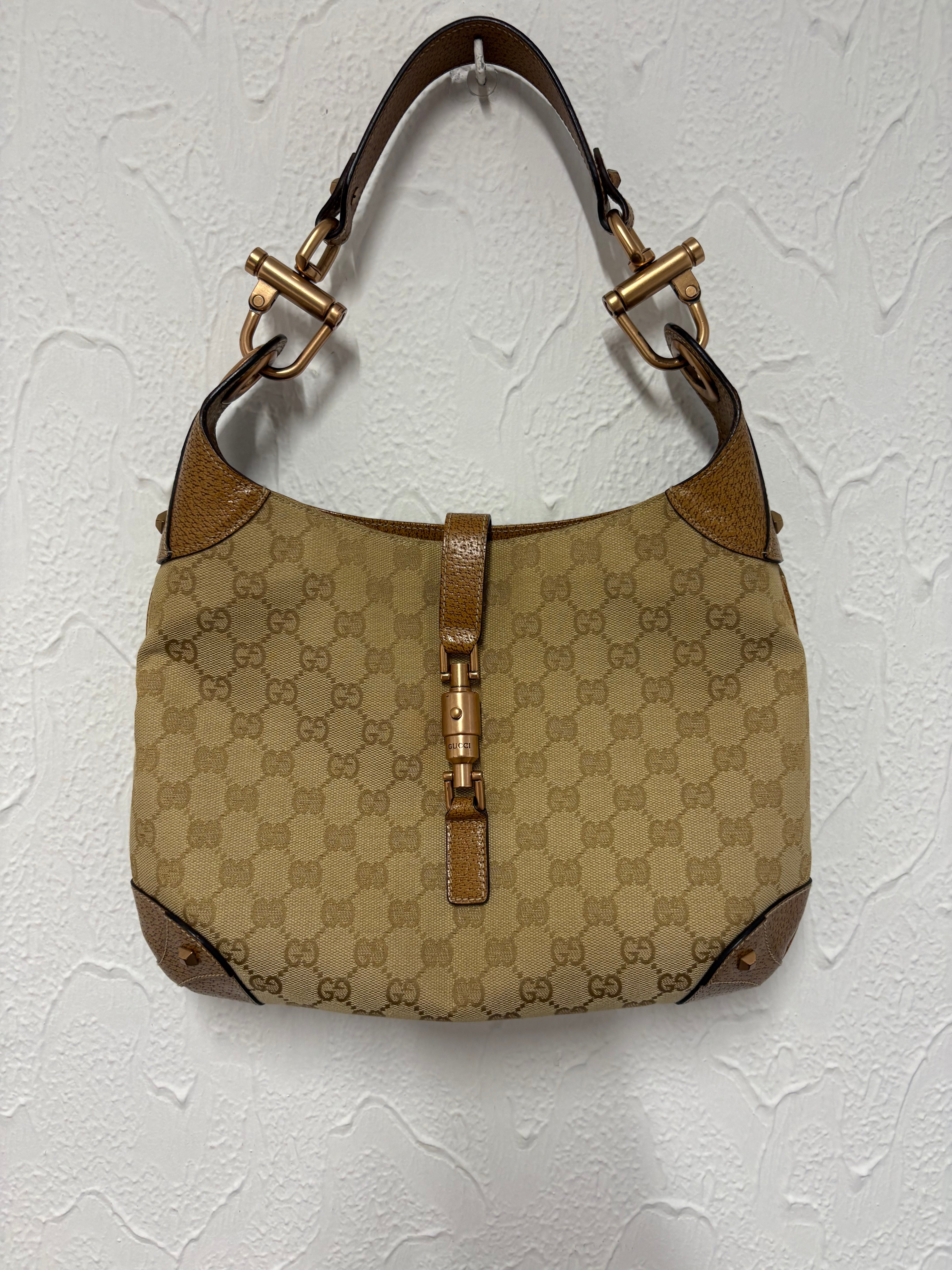 Gucci jackie gg canvas gold rosado y marron