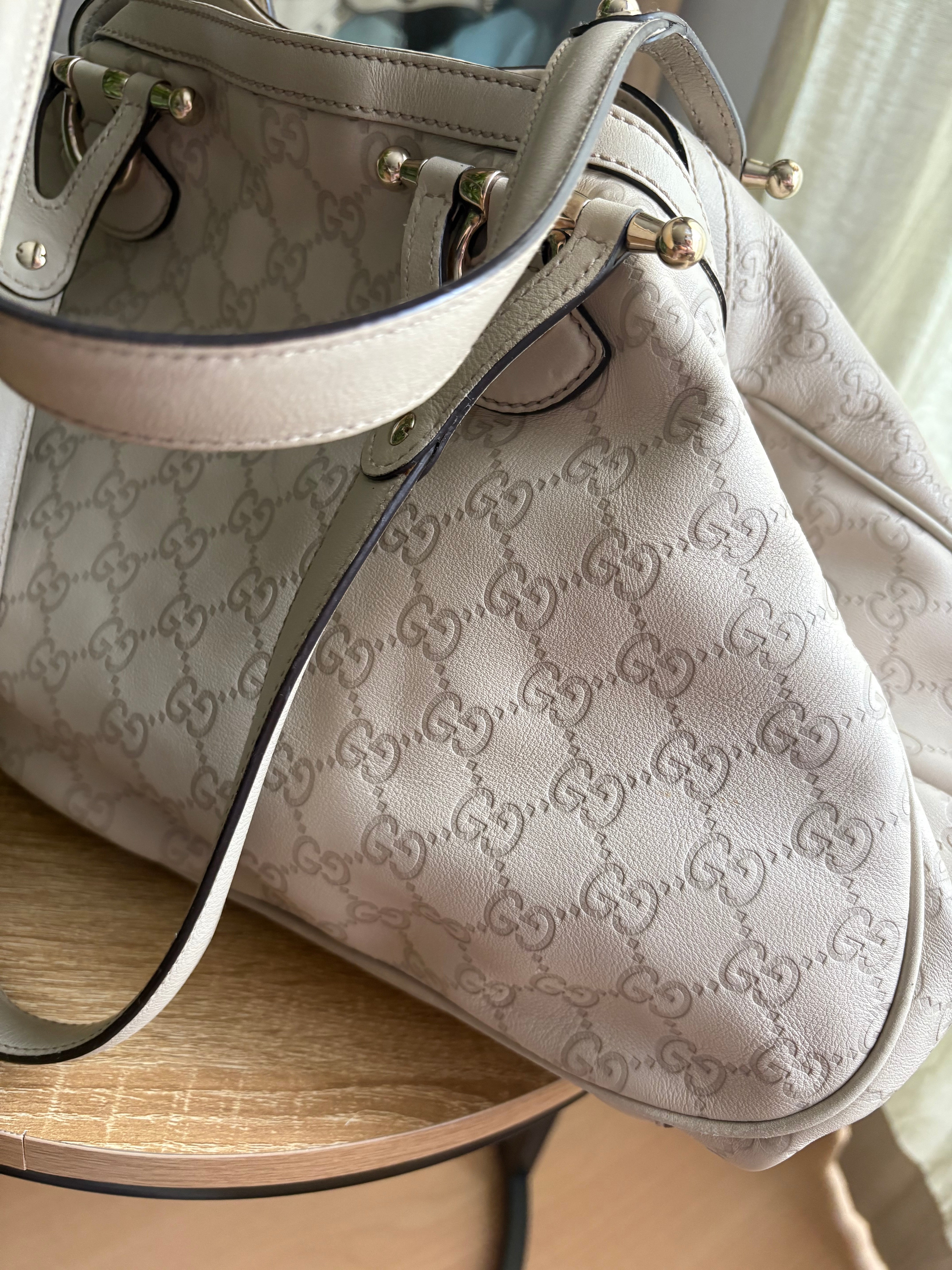 Gucci Pelham en piel Guccissima blanca