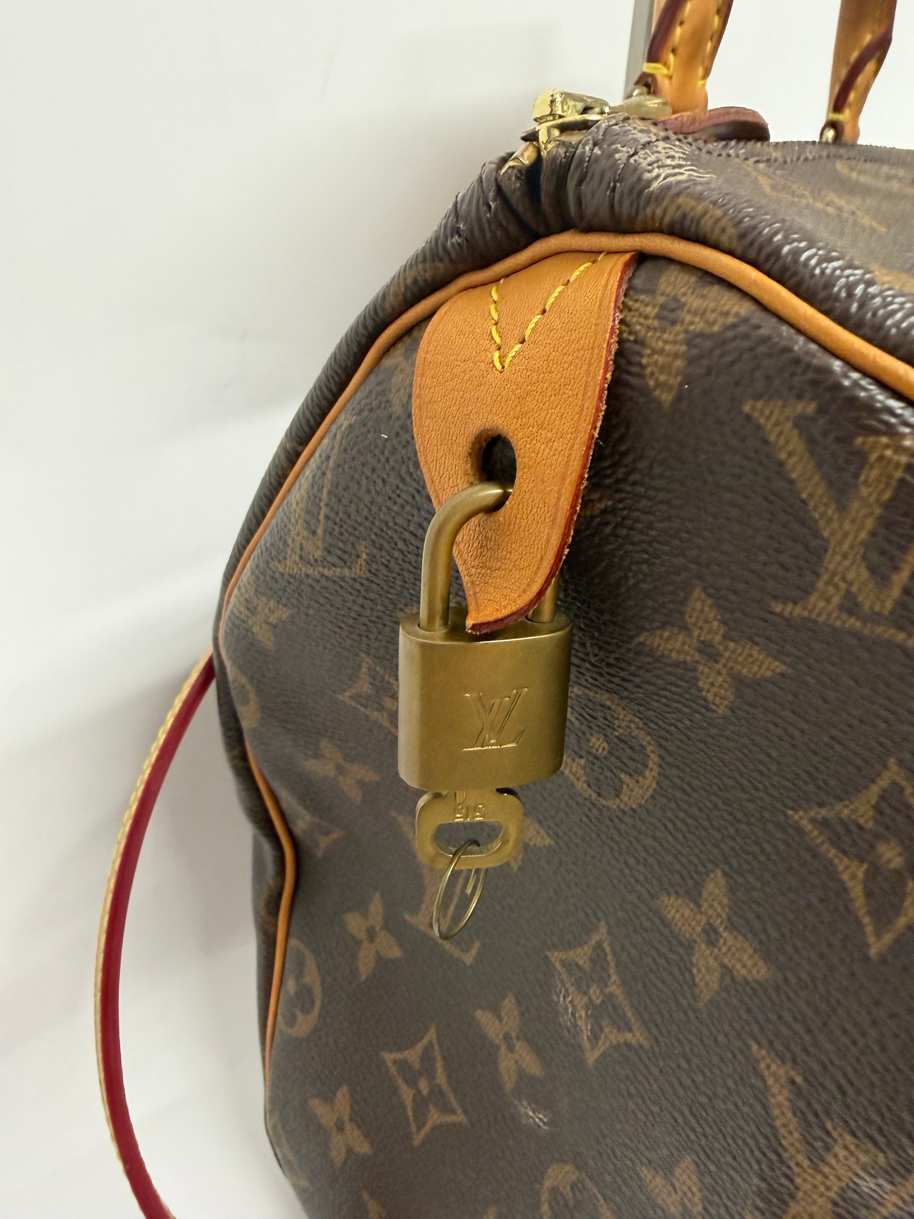 Louis Vuitton Speedy 30 Monogram con bandolera extra