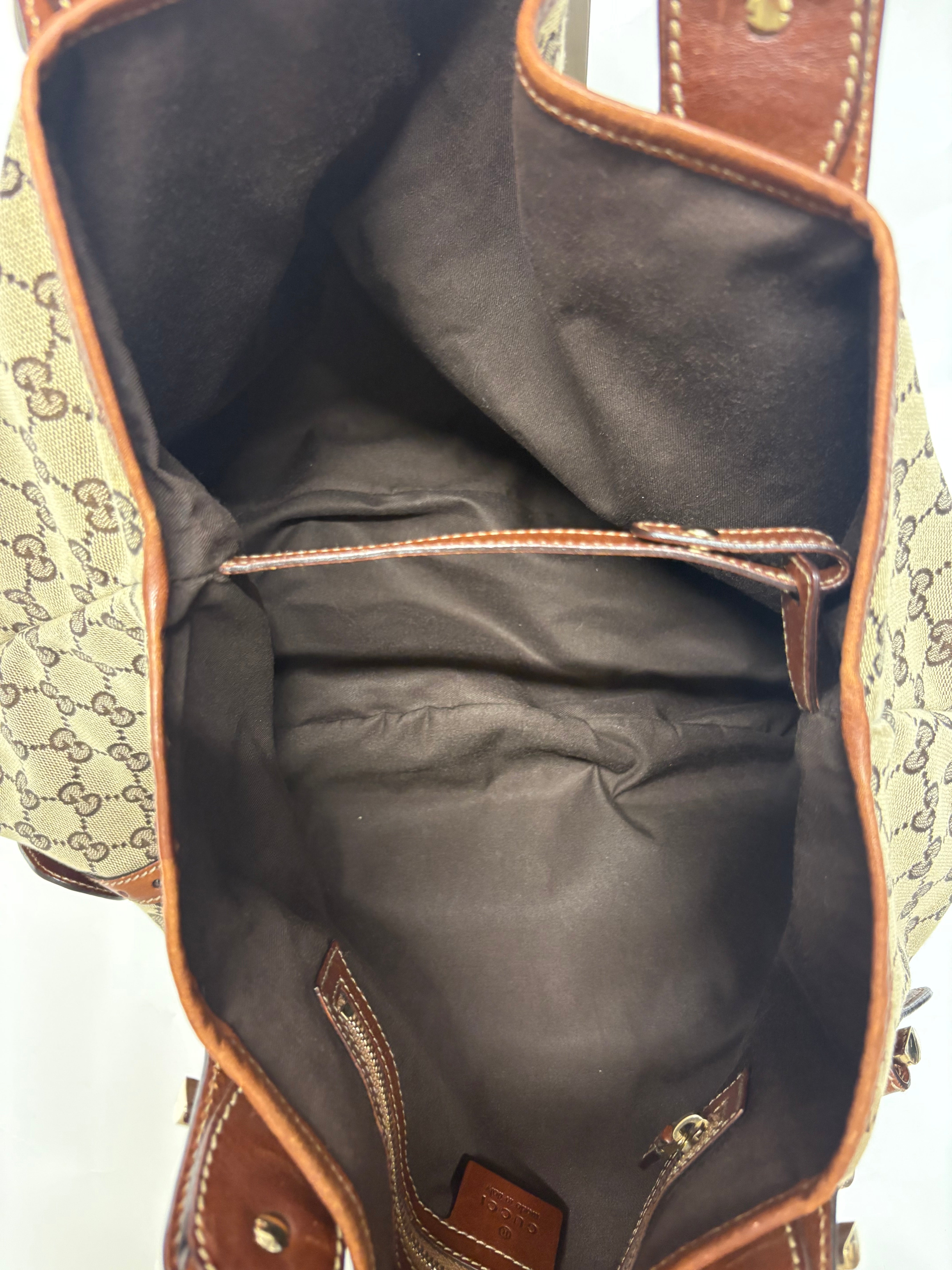 Gucci Pelham clásico en lona GG beige con piel marrón y asas trenzadas mediano