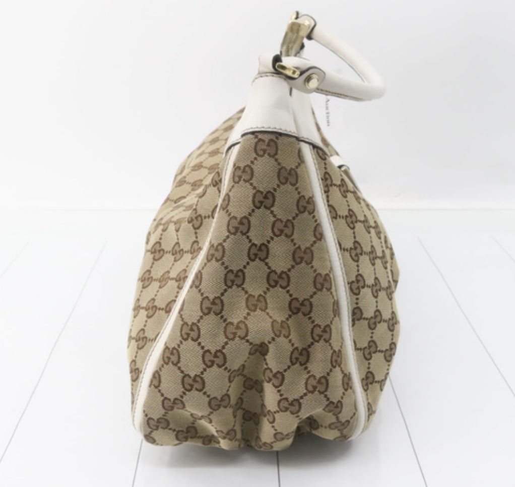 Gucci abbey gg canvas y blanco