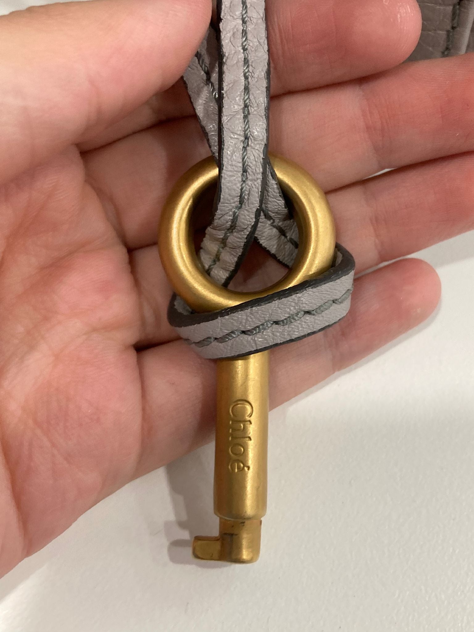 Chloé Paddington Medium Piel gris beige (greige) Candado Icono